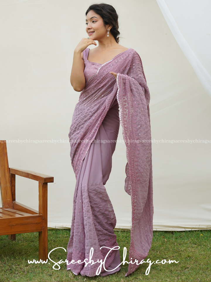 Lavender Glamorous Georgette Saree Featuring Intricate Sequence Work and Embroidery - Sarswati
