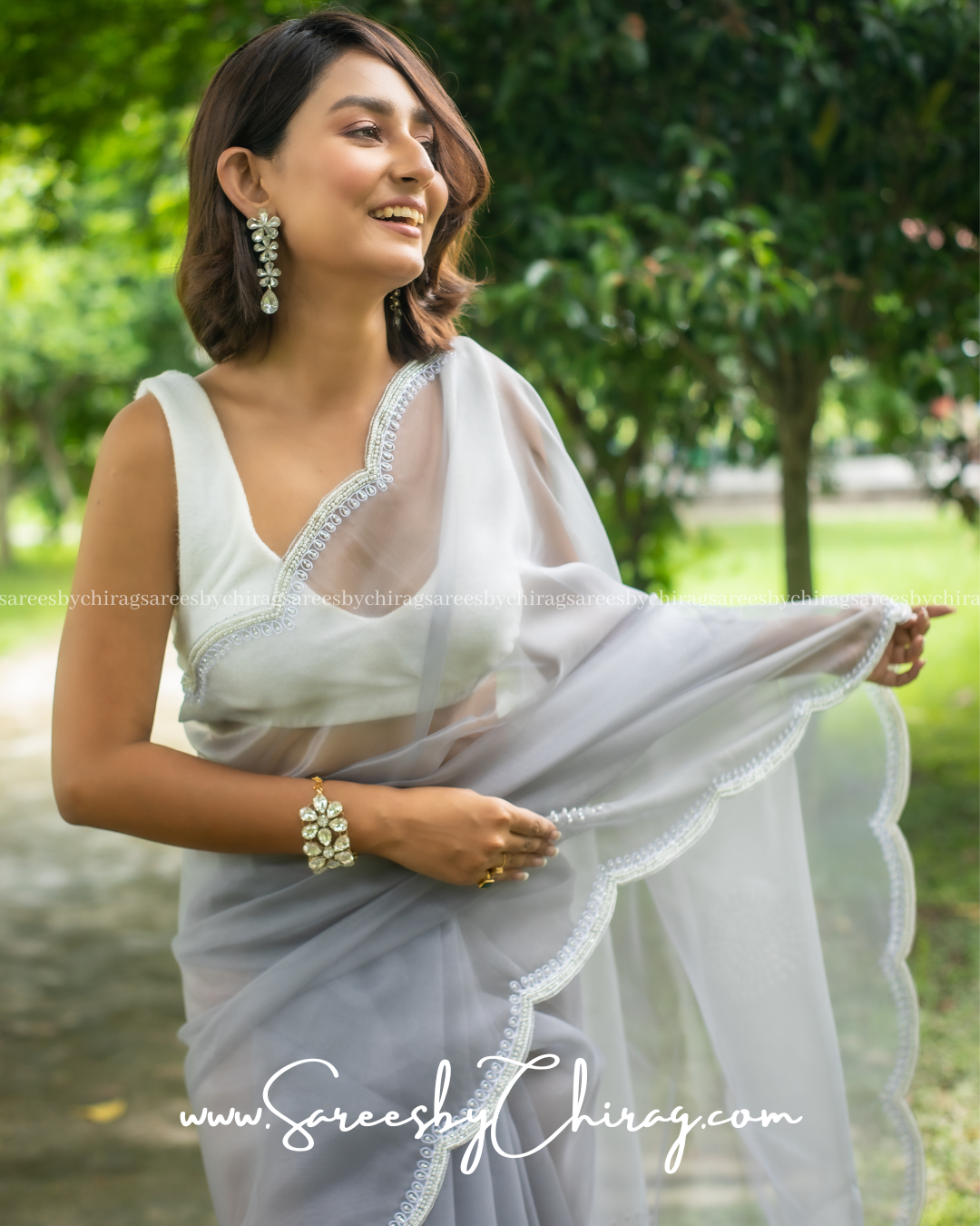 Grey Organza Saree with Exquisite Hand-Cutwork Border and Pearl Embellishments - Anika