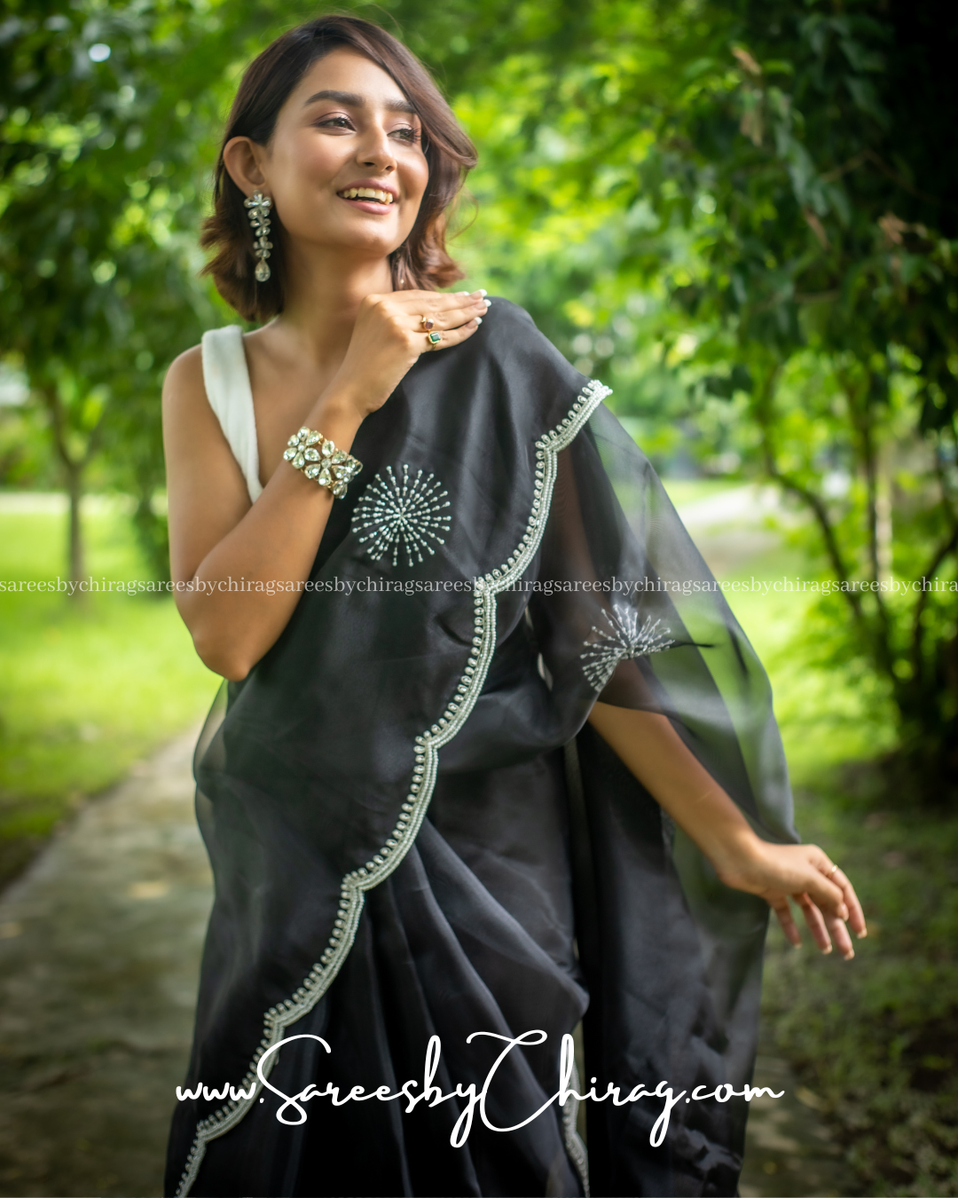 Black Organza Saree with Exquisite Hand-Cutwork Border and Pearl Embellishments - Anika