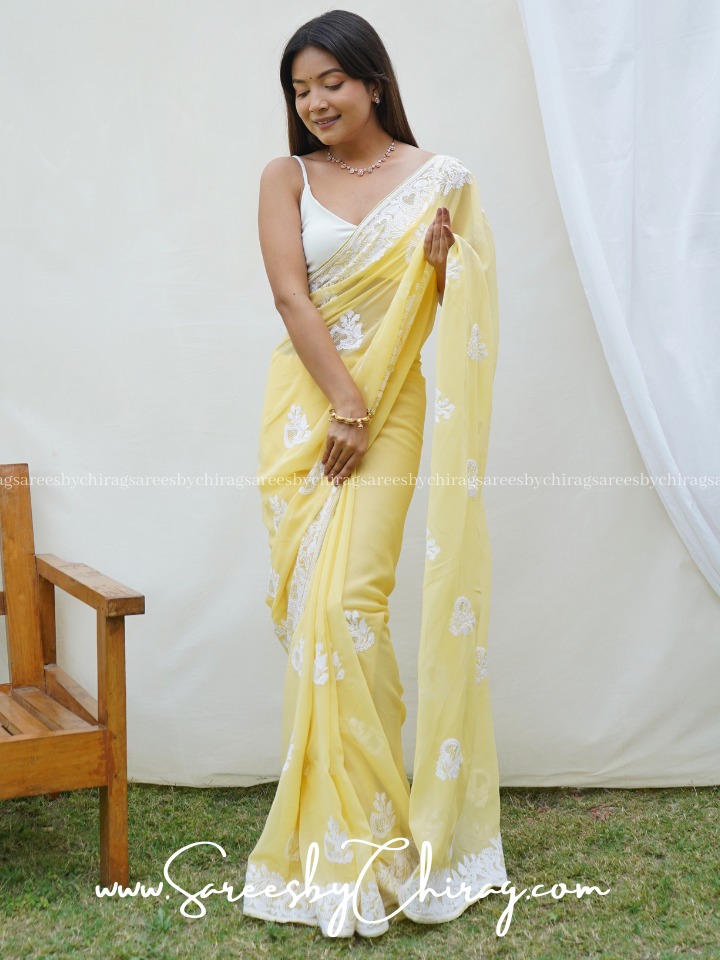 Yellow Georgette Saree adorned with Exquisite Chikankari and a Stunning Border - Riva