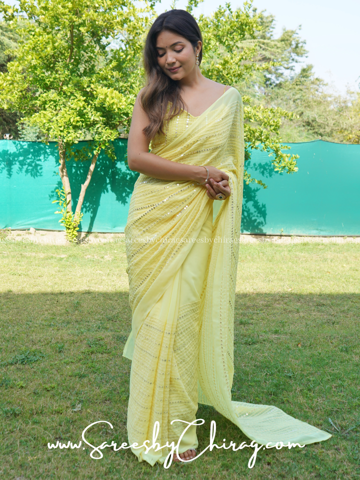 YELLOW PRINTED GEORGETTE SAREE WITH BLOUSE PIECE