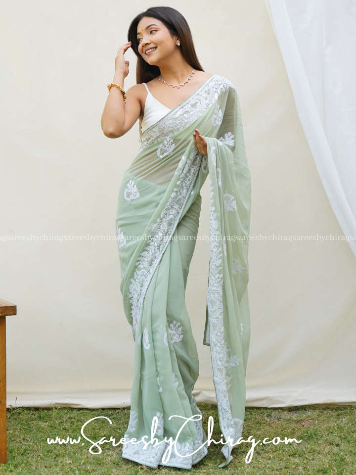 Sea Green Georgette Saree adorned with Exquisite Chikankari and a Stunning Border - Riva
